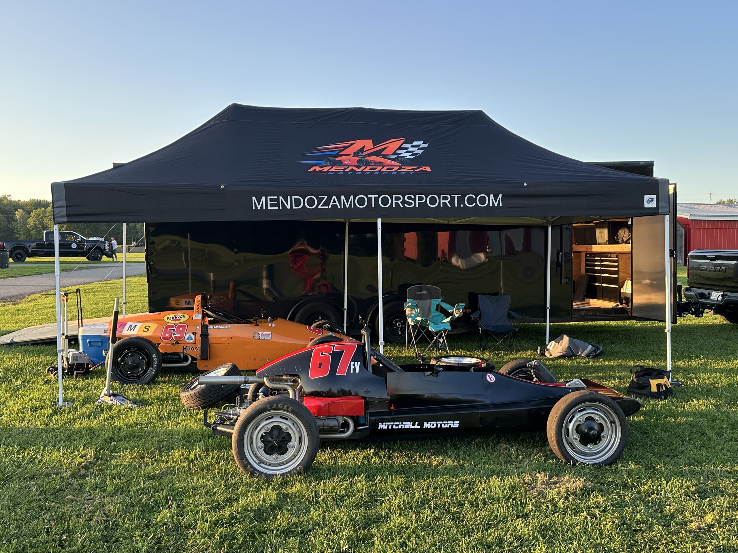 Mendoza Motorsport paddock with both cars ready to race at Nelson Ledges